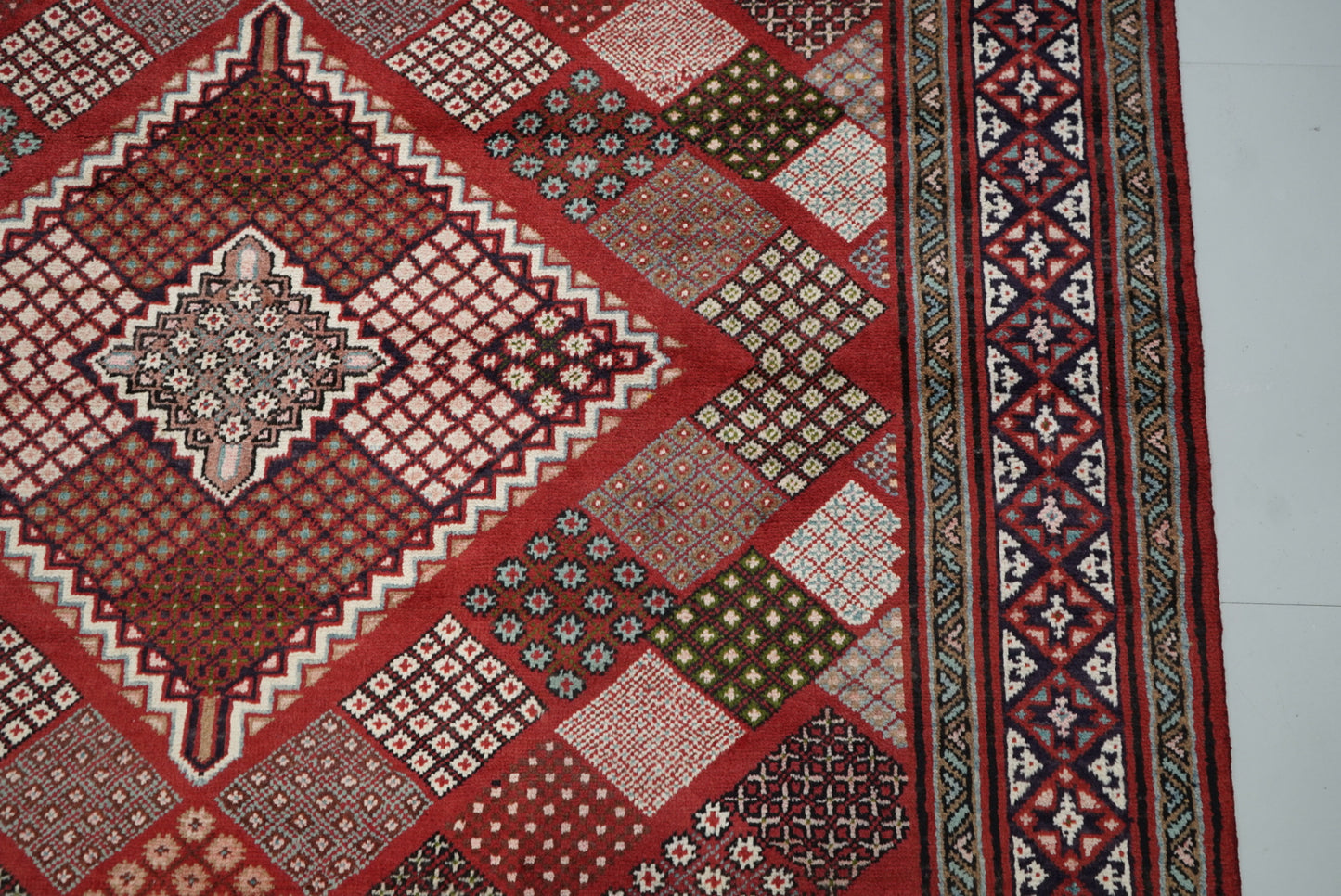 Handmade Persian Mahabad Geometric Wool Rug | 291 x 202 cm | Red & Multi | Vintage