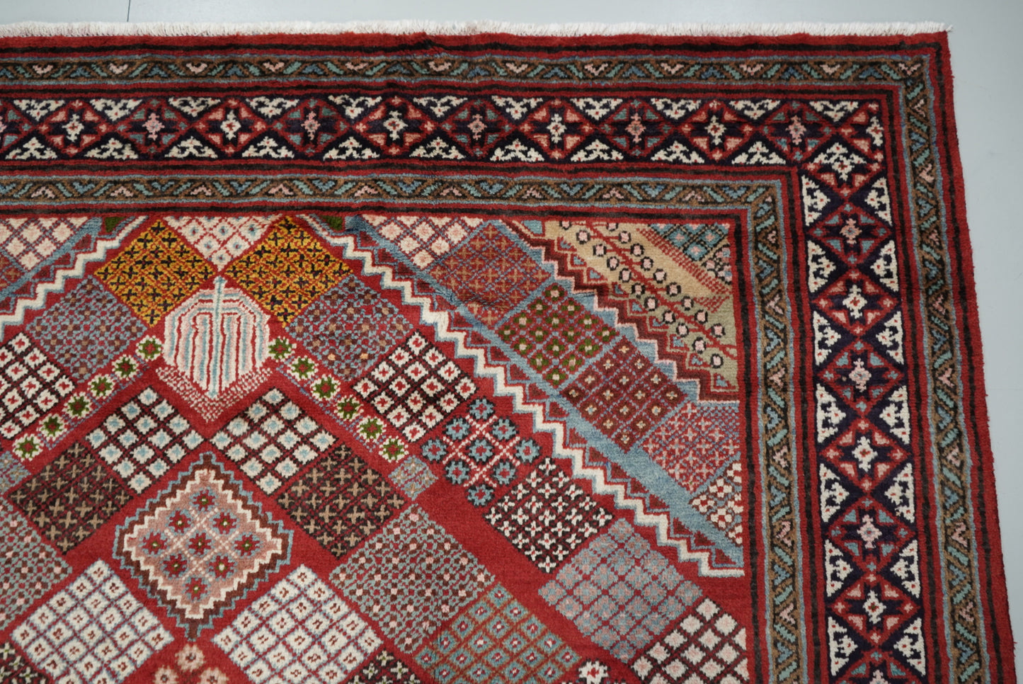 Handmade Persian Mahabad Geometric Wool Rug | 291 x 202 cm | Red & Multi | Vintage