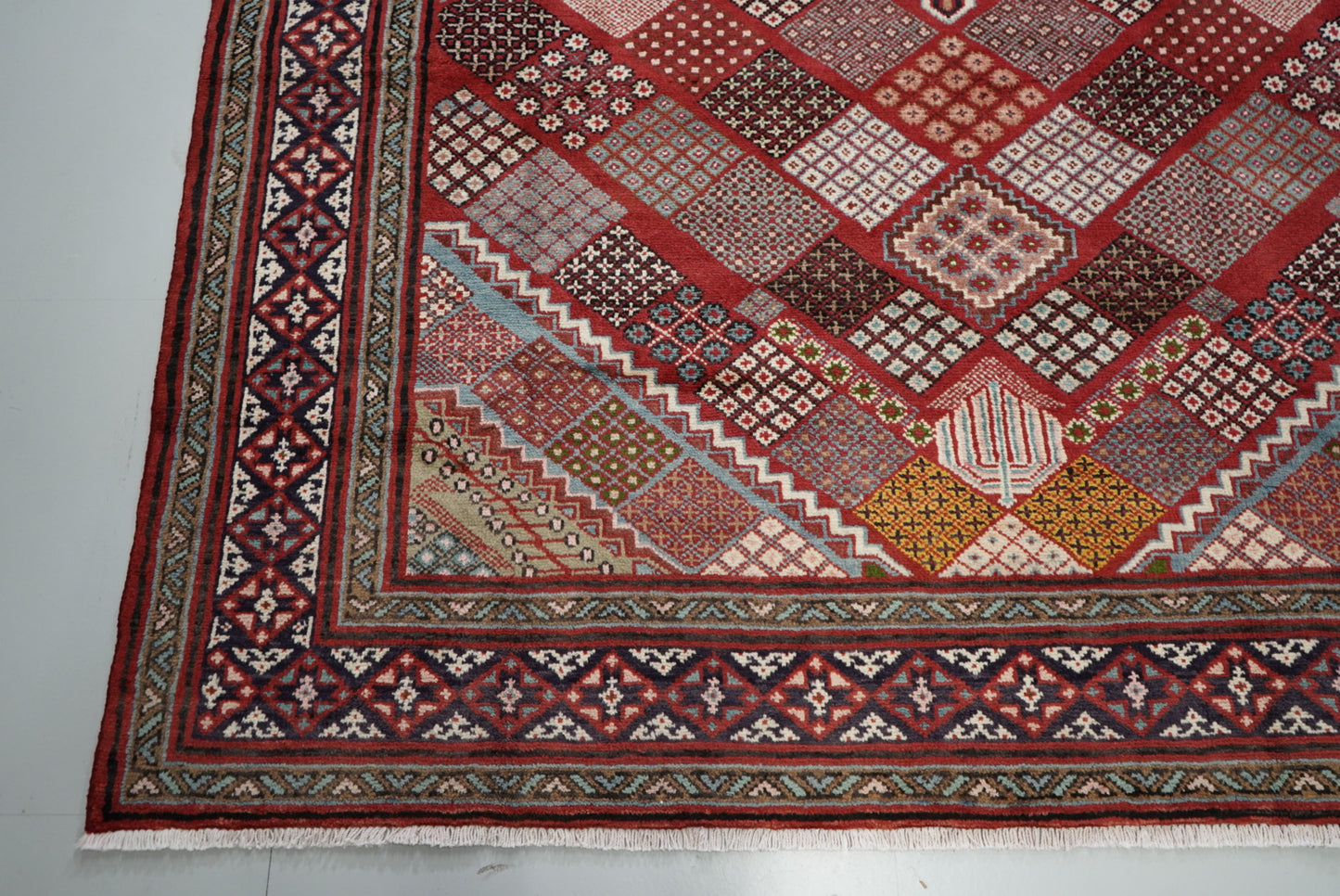 Handmade Persian Mahabad Geometric Wool Rug | 291 x 202 cm | Red & Multi | Vintage