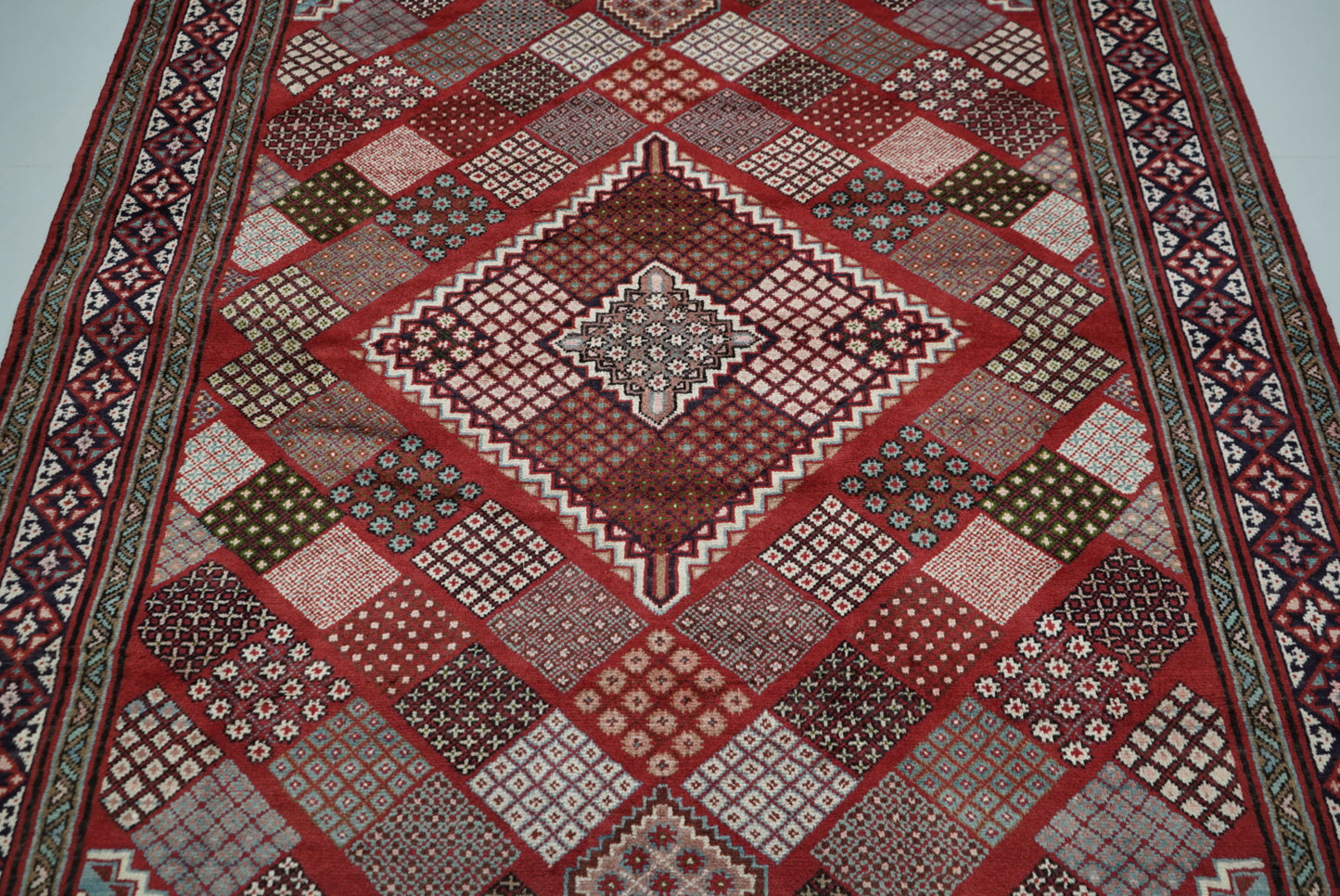 Handmade Persian Mahabad Geometric Wool Rug | 291 x 202 cm | Red & Multi | Vintage