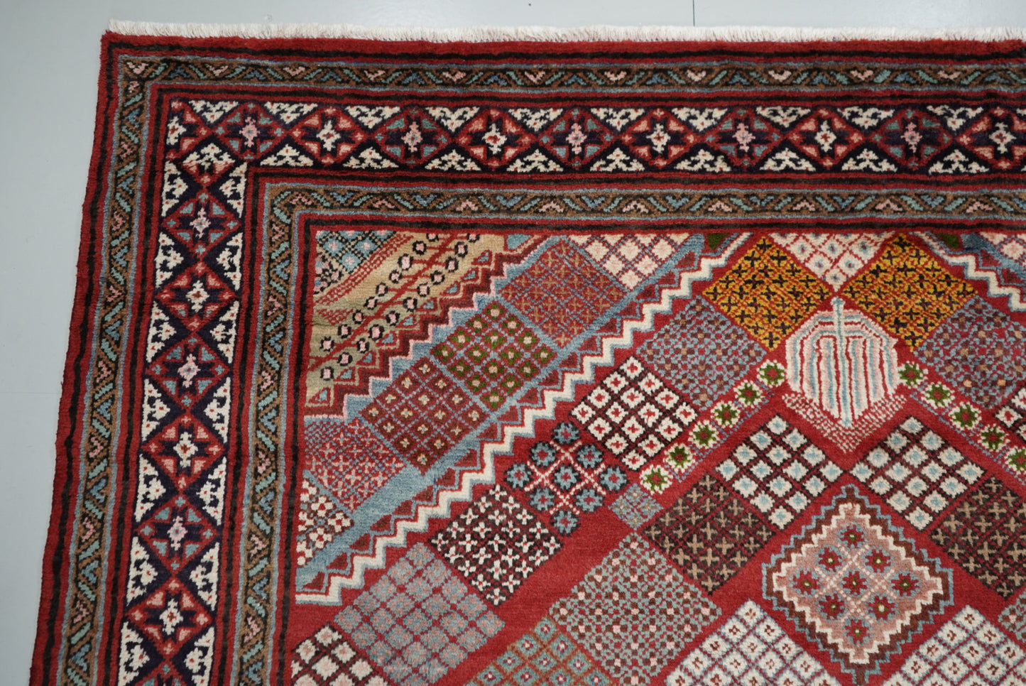 Handmade Persian Mahabad Geometric Wool Rug | 291 x 202 cm | Red & Multi | Vintage