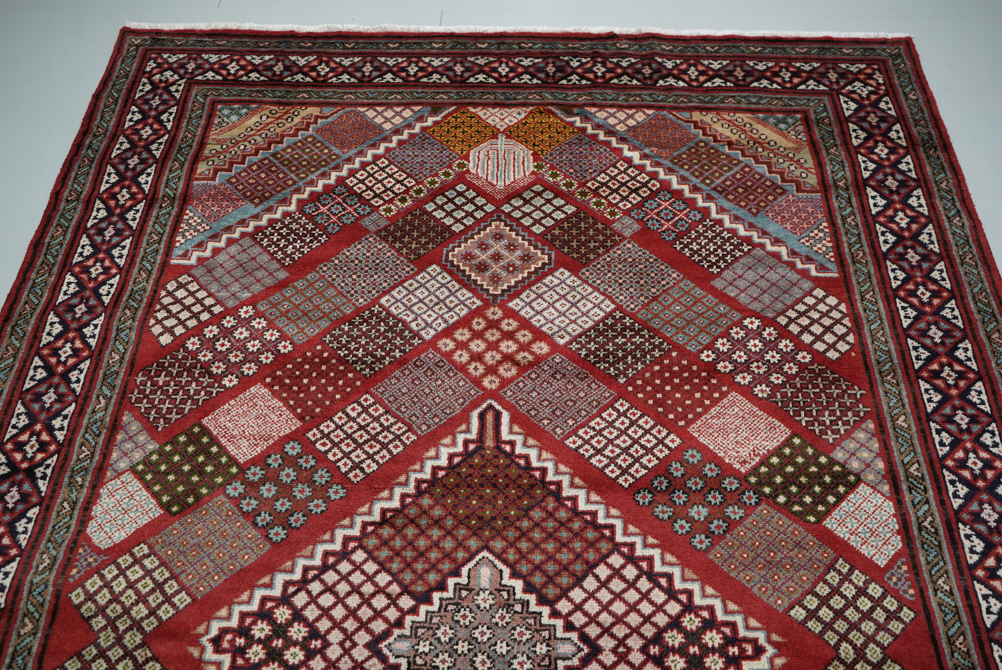 Handmade Persian Mahabad Geometric Wool Rug | 291 x 202 cm | Red & Multi | Vintage